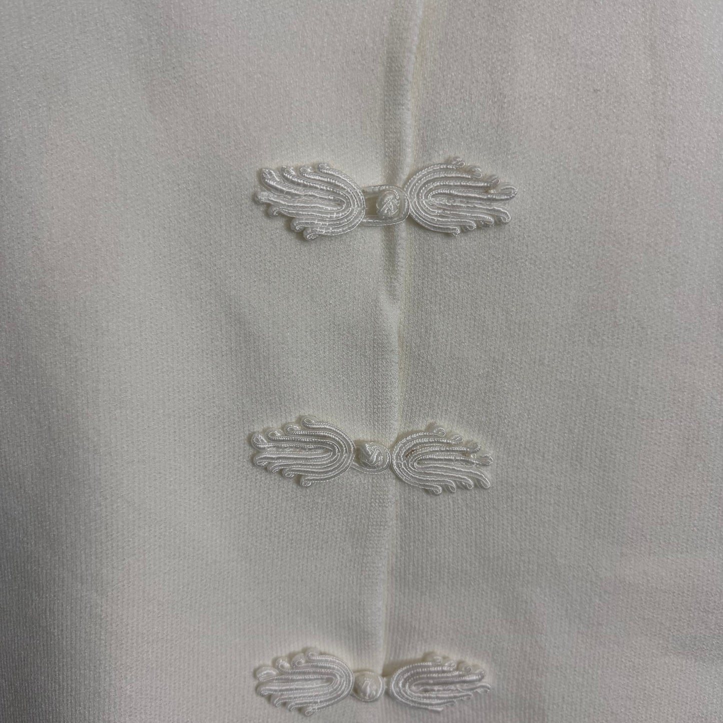 White knitted military waistcoat