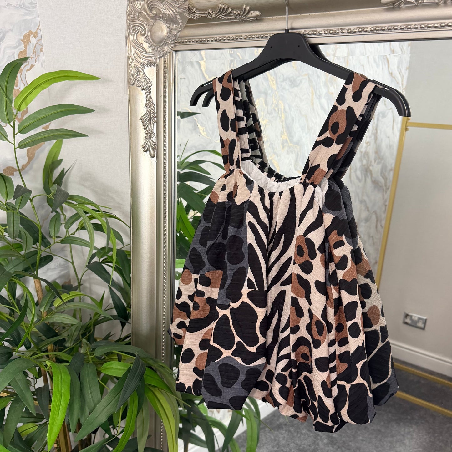 Animal print bubble hem top