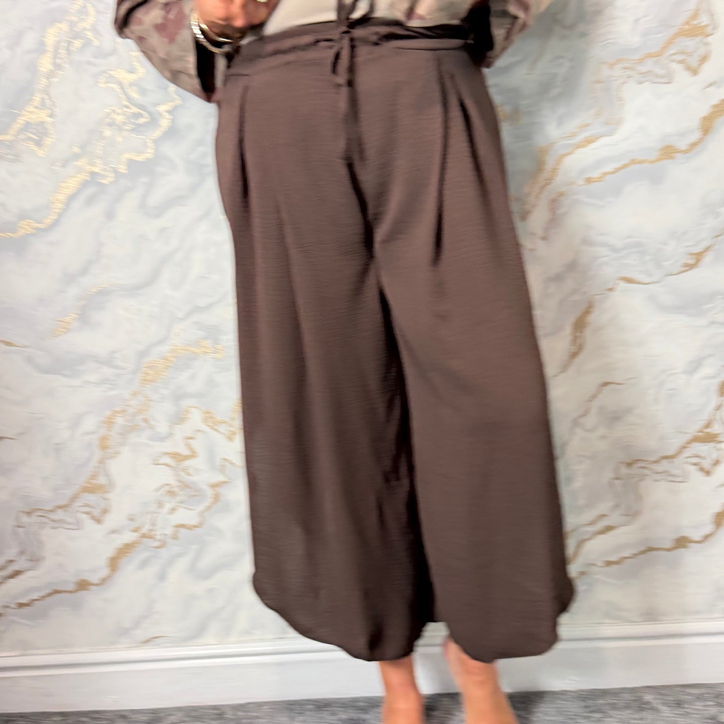 Brown pleat front trousers