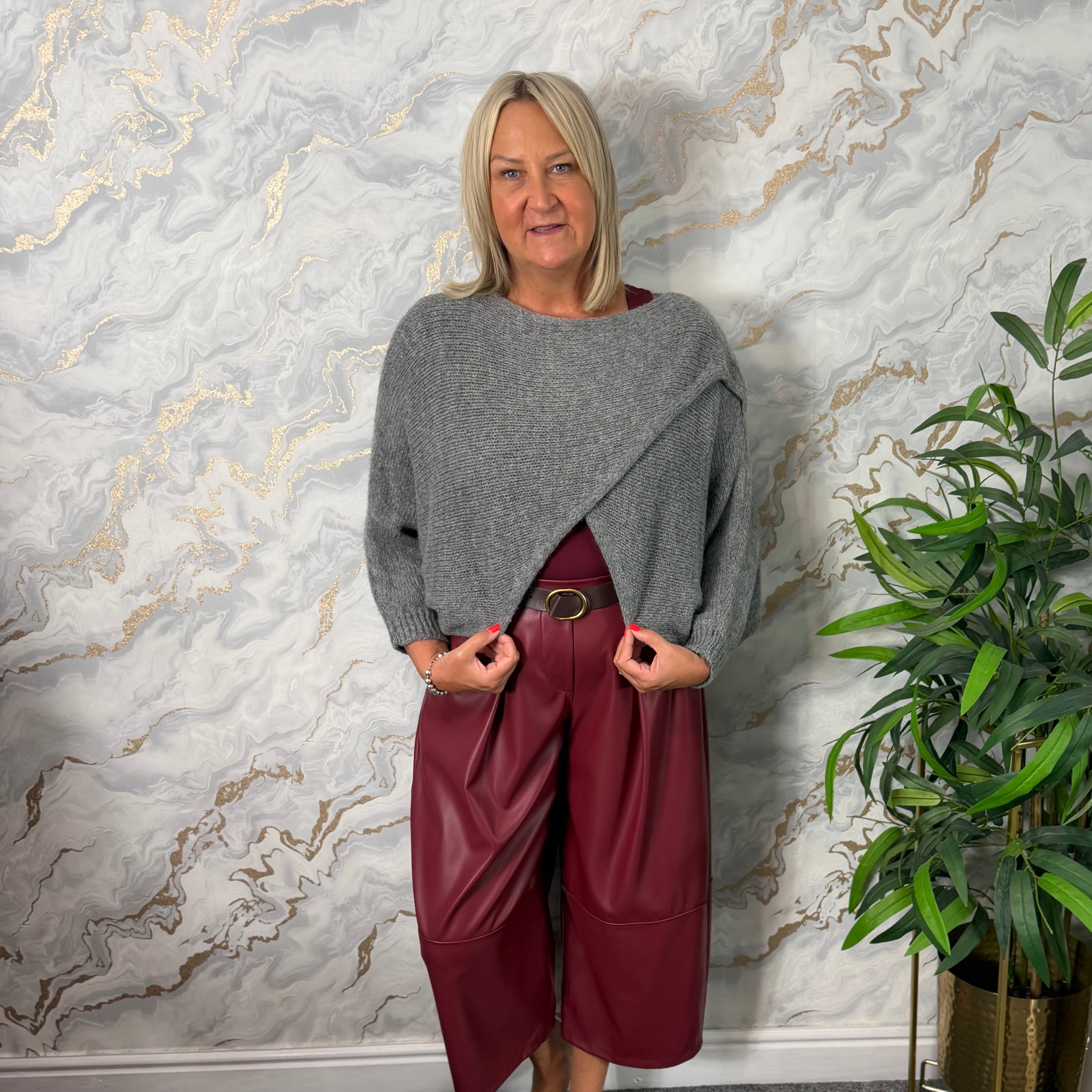 Grey crossover jumper