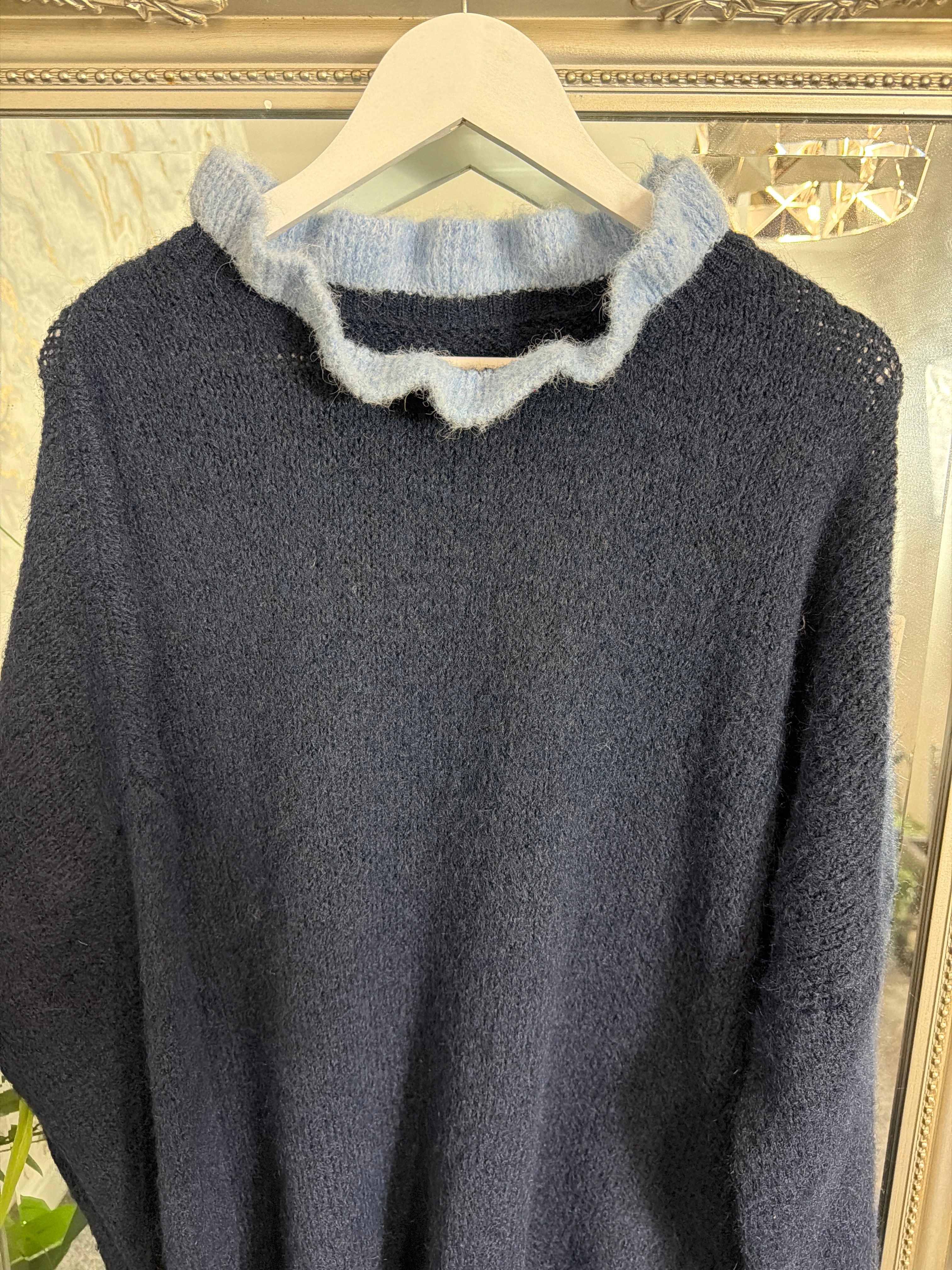Navy frill neck jumper