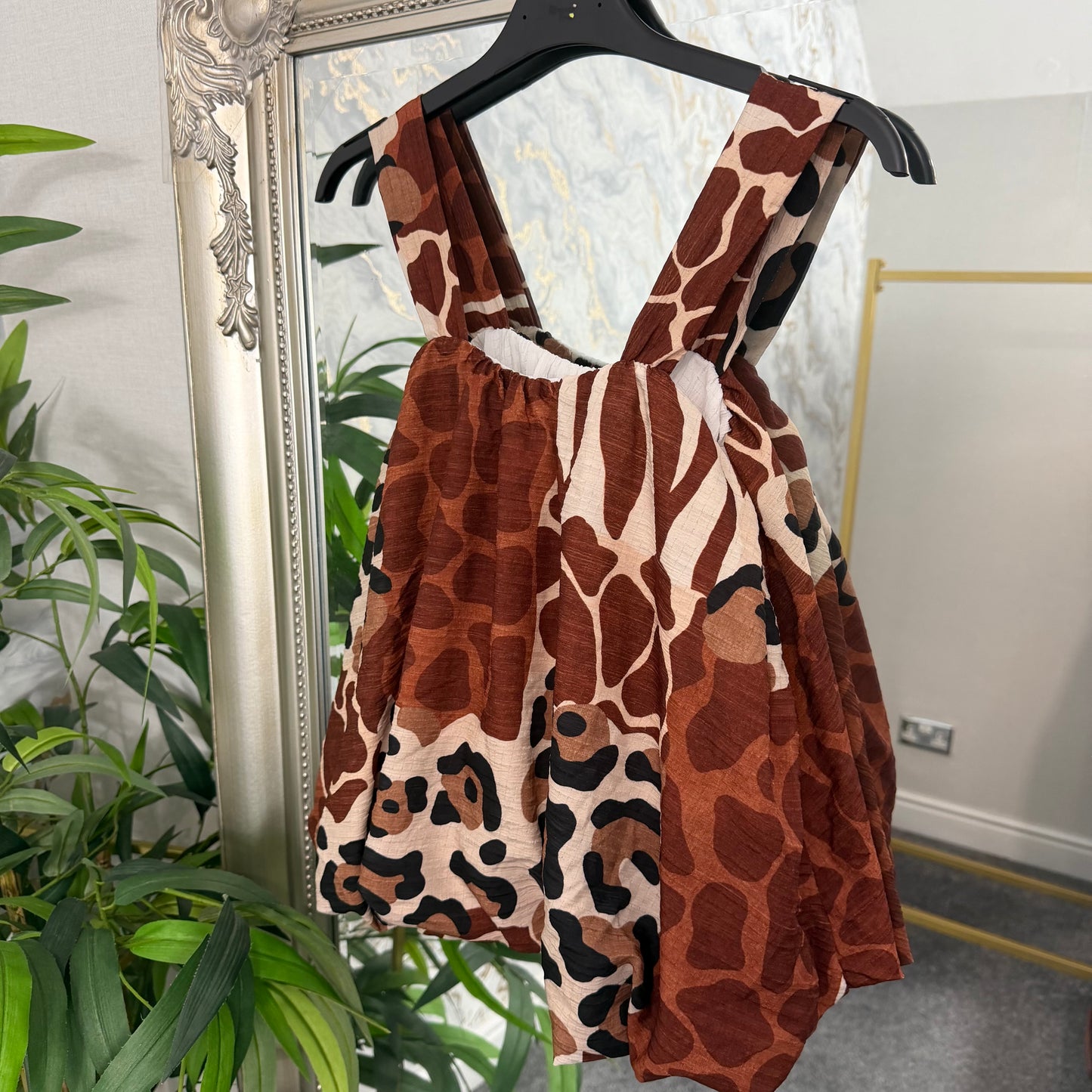 Animal print bubble hem top