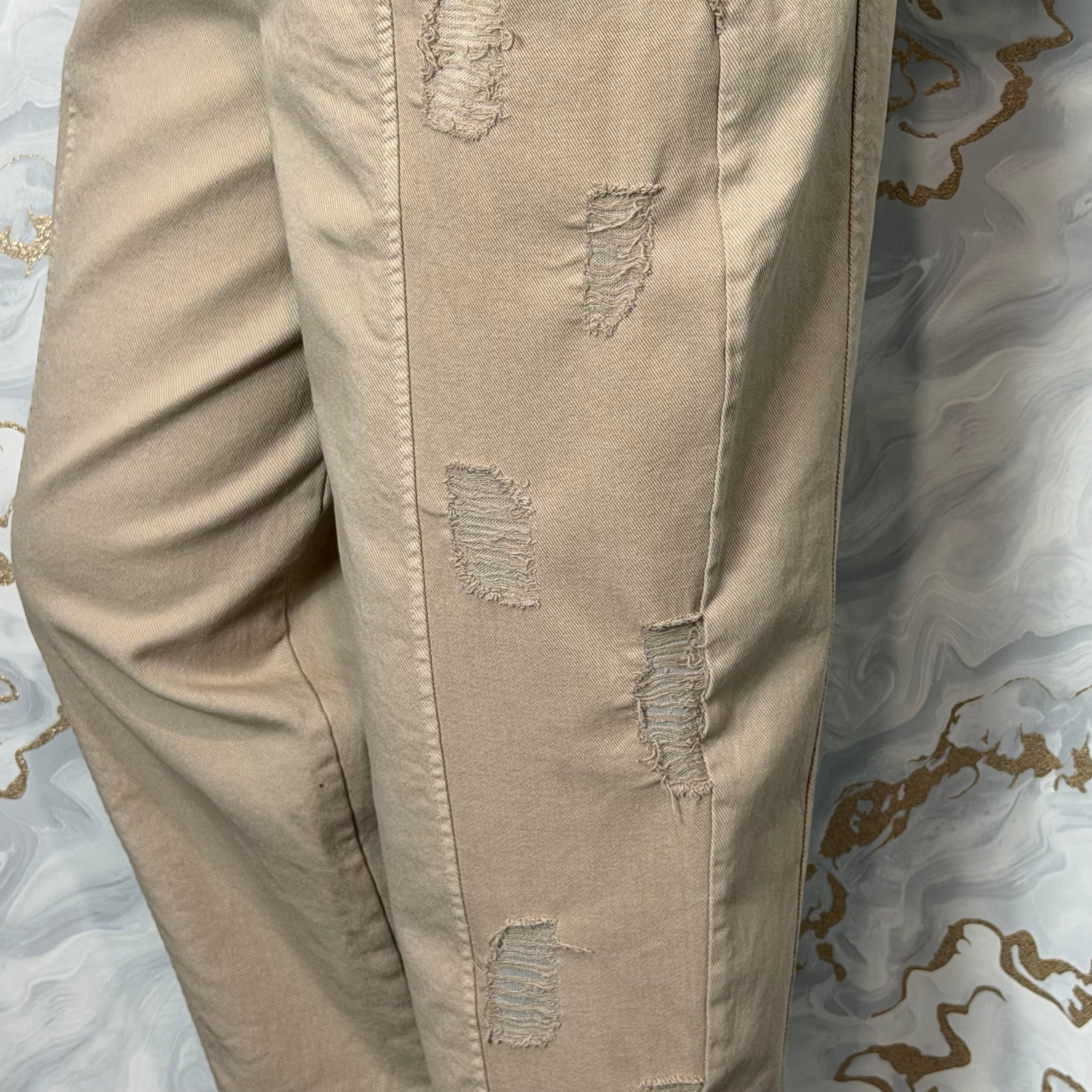 Distressed barrel leg trousers