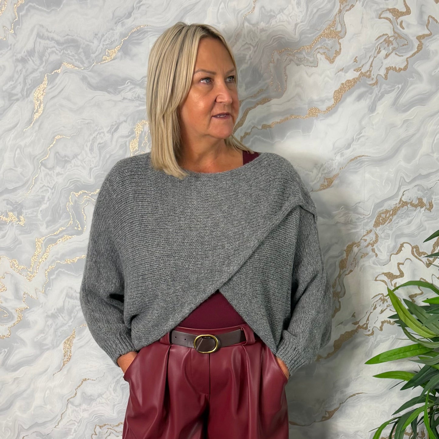 Grey crossover jumper