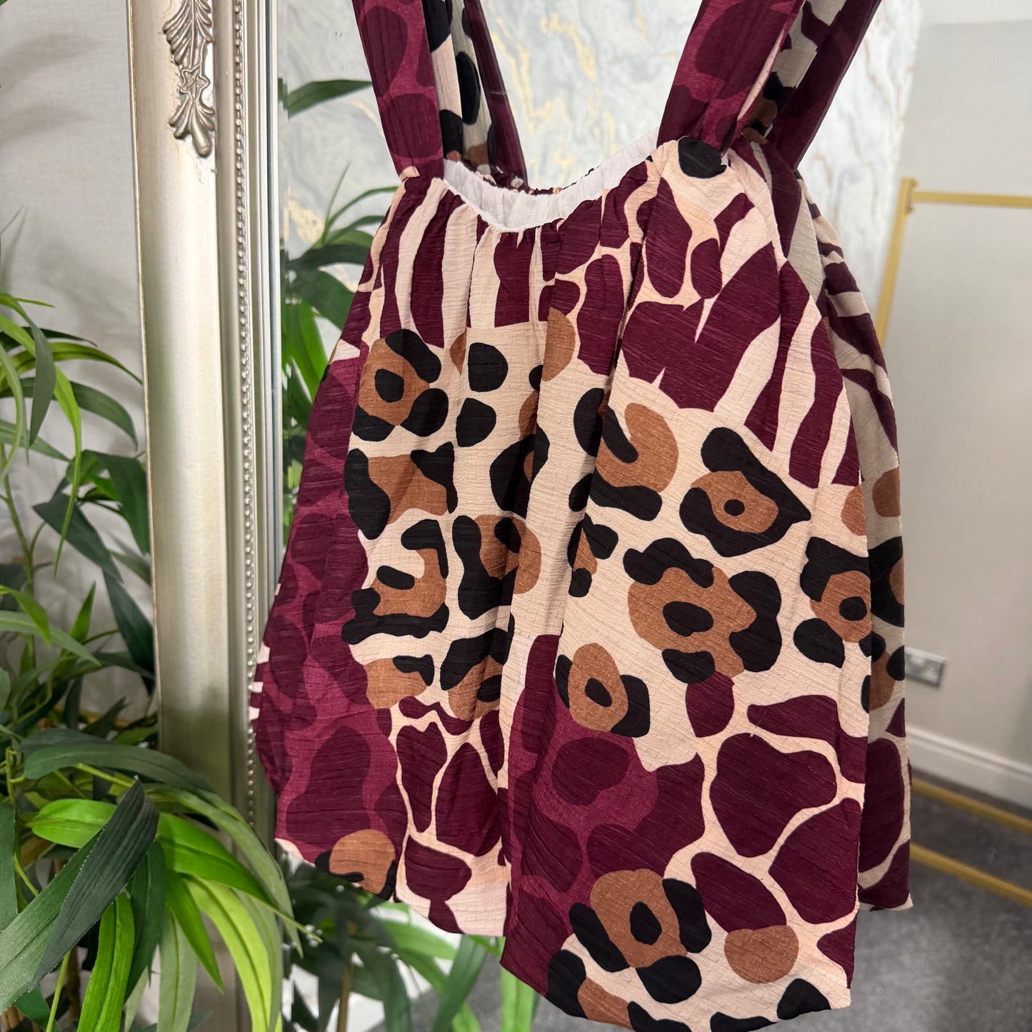 Animal print bubble hem top