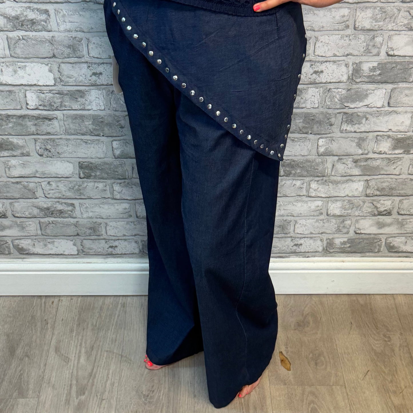 Indigo jeans with detachable studded scarf
